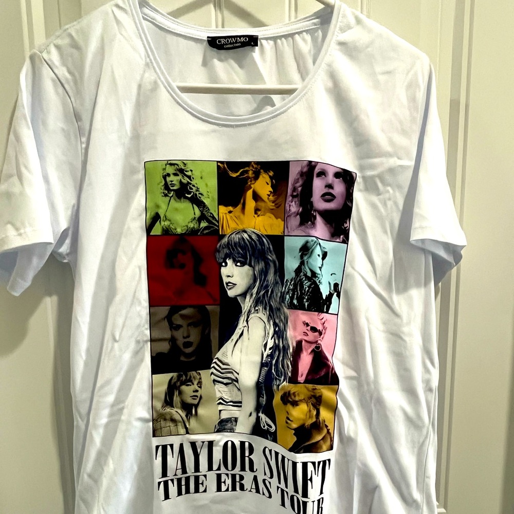 The Eras Tour Taylor Swift TShirt. Never worn. 
Size Large